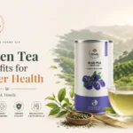 Premium loose leaf green tea with fresh tea leaves and ceramic tea cup by Timely Tea